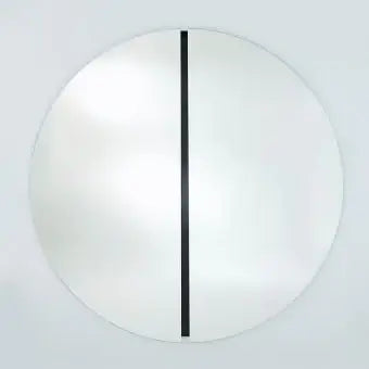 Grand miroir rond noir 150 cm captant la lumière naturelle, effet de profondeur