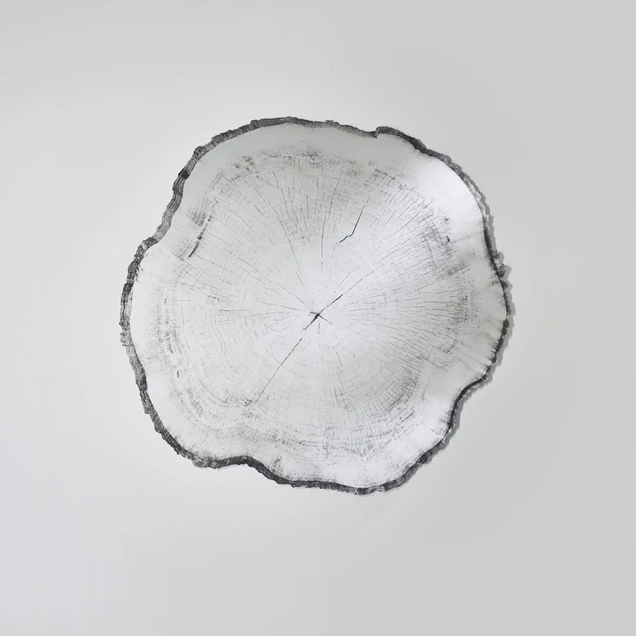 Détail de la texture et qualité artisanale de la sérigraphie noire sur miroir